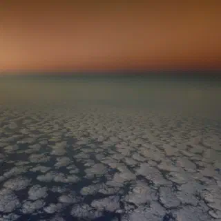 Picture out of the airplane sunset above the clouds